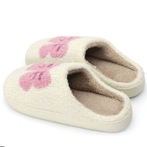 Cream Plush Slip-On Slippers with Pink Bow Accent
